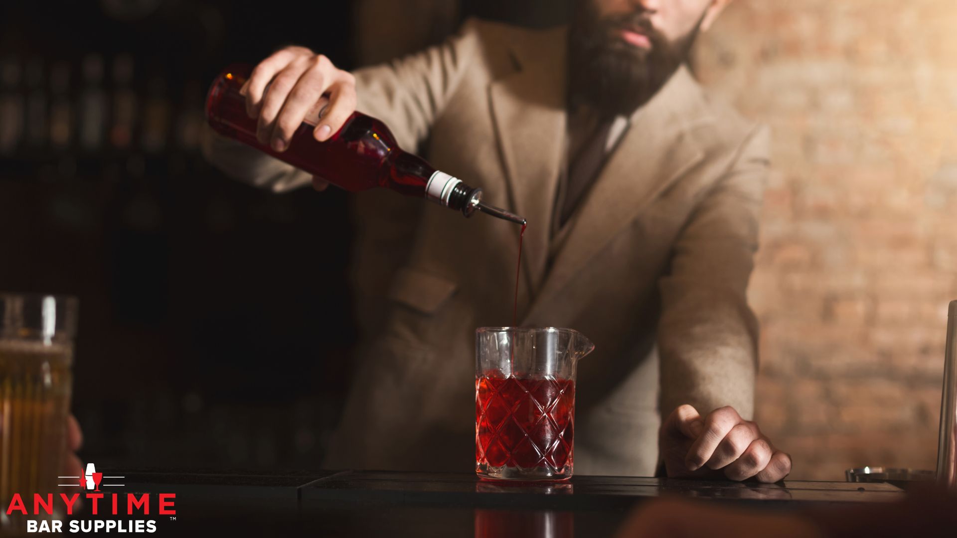 bartender pouring an alcoholic drink - Anytime Bar Supplies Bulk Speed Pourers