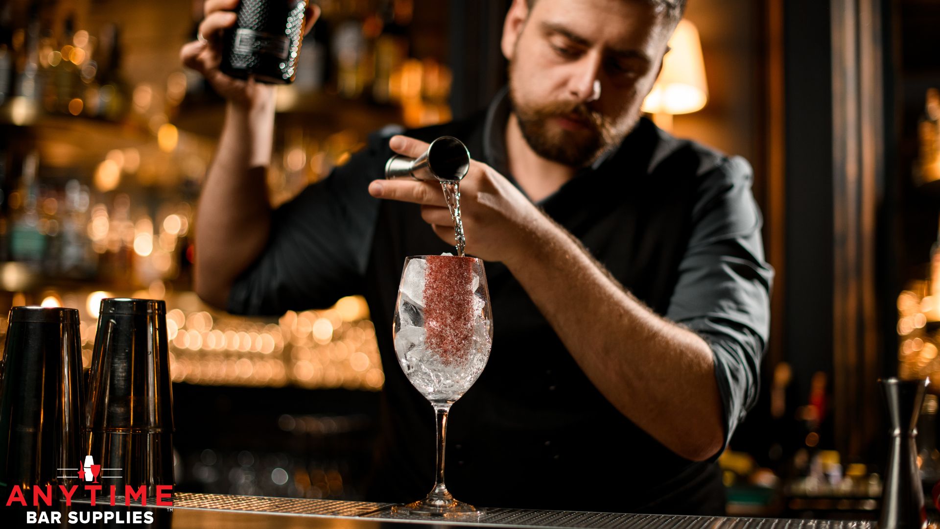 bartender pouring an alcoholic drink - Anytime Bar Supplies wholesale pour spouts